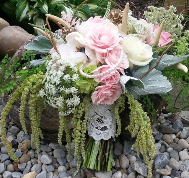 Bouquet featuring antlers, lace, and pearls